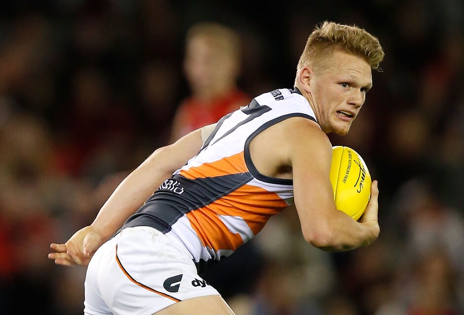 AFL 2015 Rd 23 - Melbourne v GWS Giants MELBOURNE, AUSTRALIA - SEPTEMBER 6: Adam Treloar of the Giants in action during the 2015 AFL round 23 match between the Melbourne Demons and the GWS Giants at Etihad Stadium, Melbourne, Australia on September 6, 2015. (Photo by Michael Willson/AFL Media)